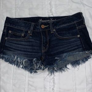 American Eagle distressed hem denim shorts